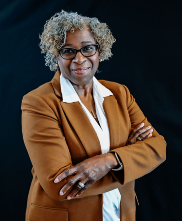 Linda_standing_Armsfolded